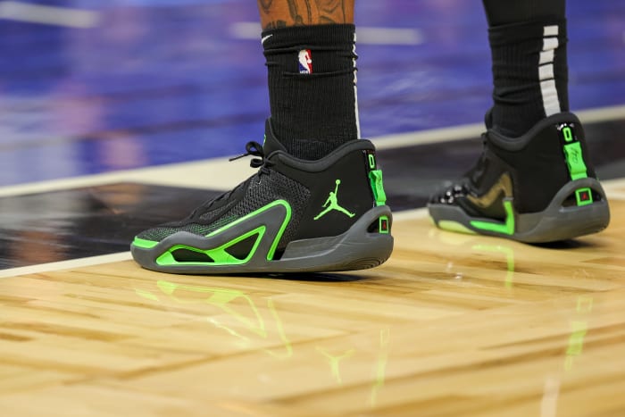 Jayson Tatum's black and green Jordan Brand sneakers.